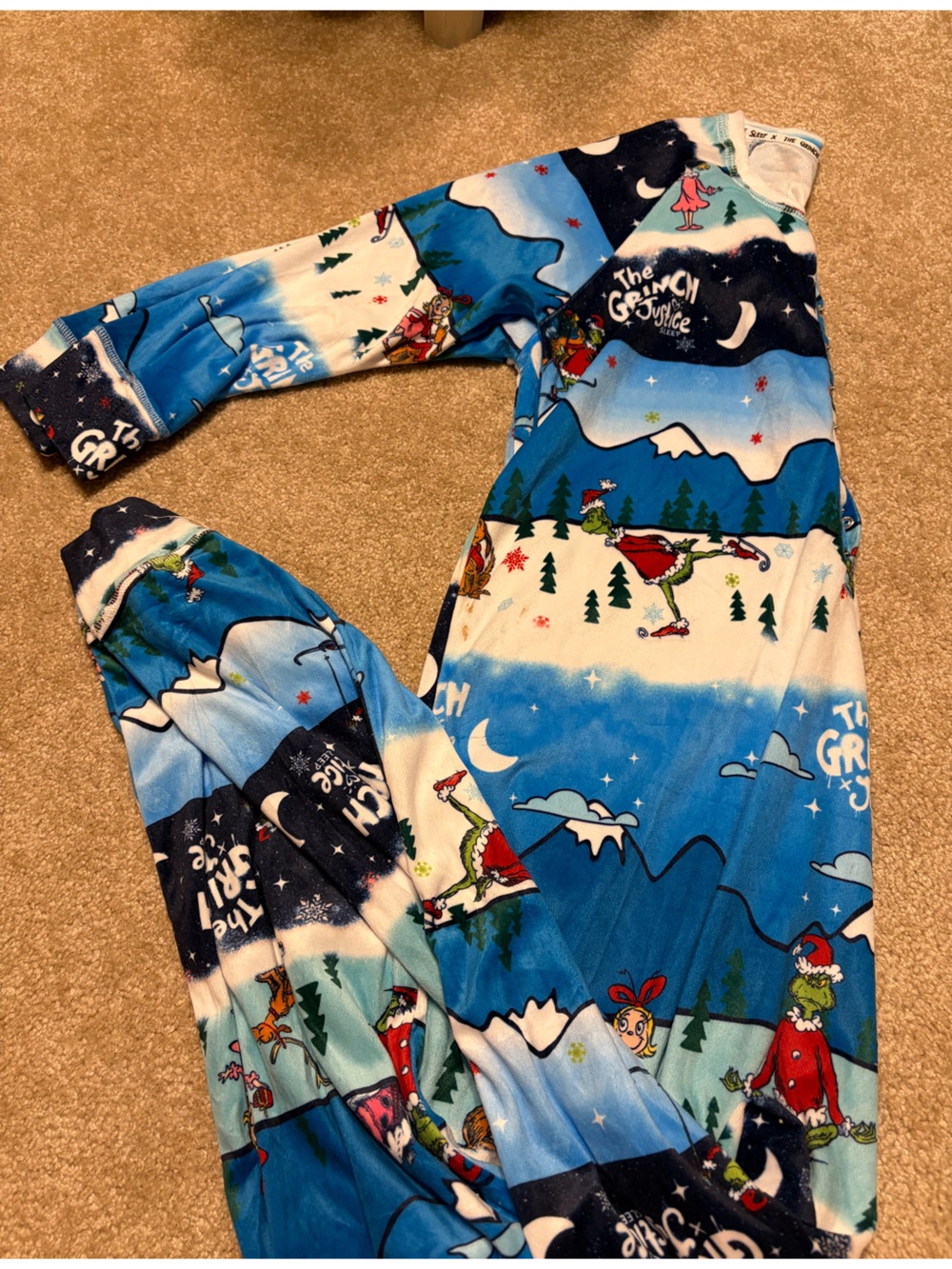 Justice White onesie with Green The Grinch Logo
